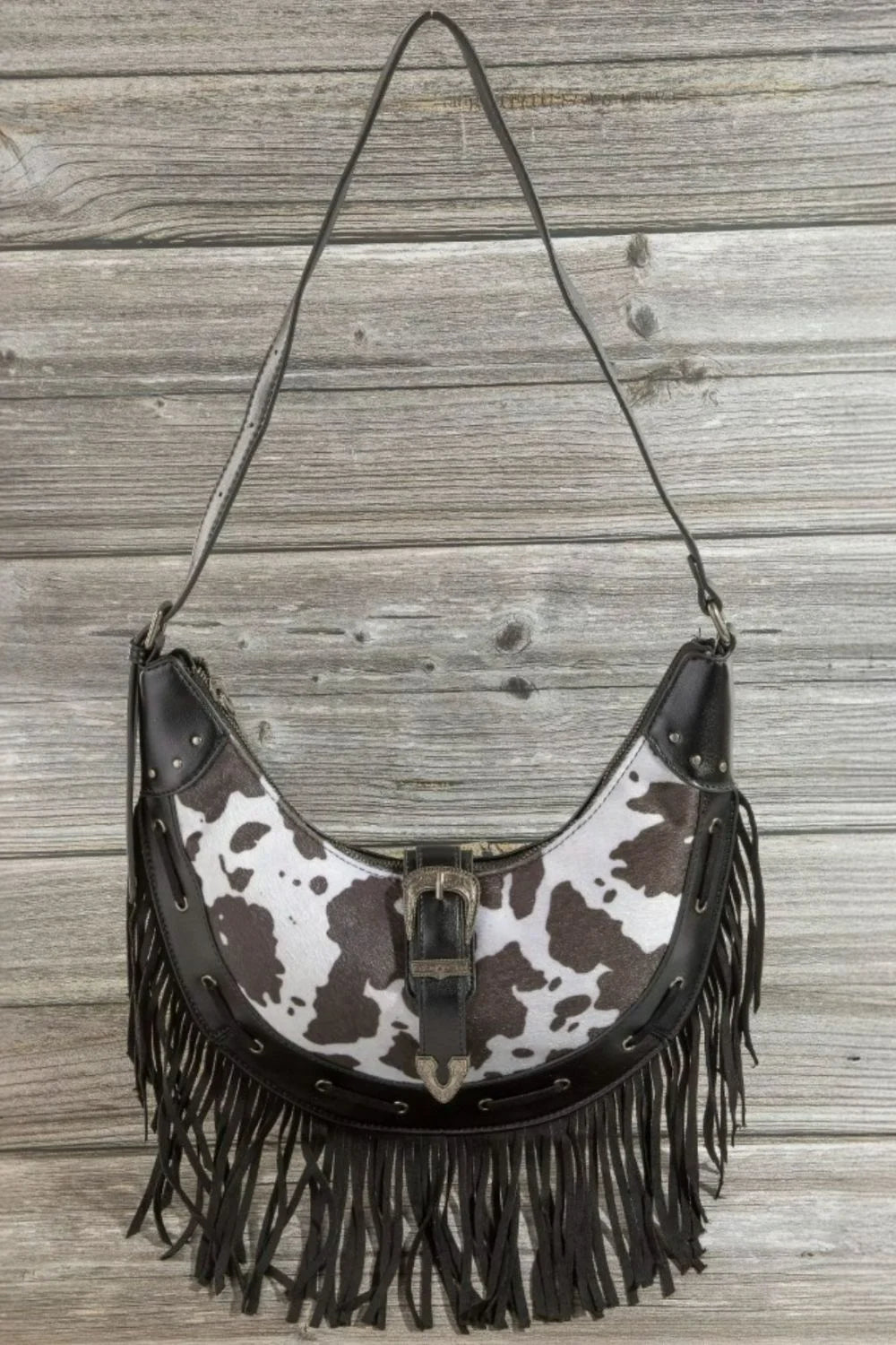 Fame Cow Print Faux Leather Fringe Hobo Bag - Cow Print / one size